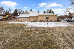 View of snow covered property