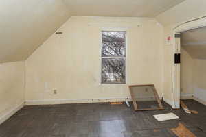 Additional living space with vaulted ceiling