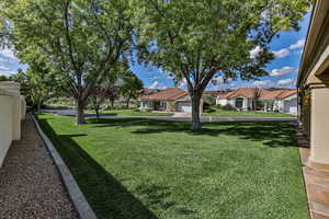 View of yard featuring a garage