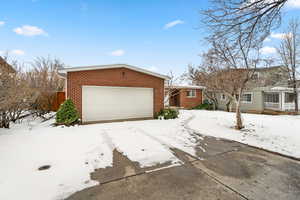 Single story home with a garage