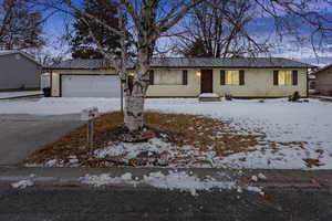 Single story home with a garage