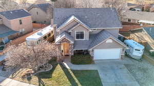 View of front of property with a garage