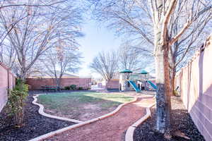 View of yard with a playground