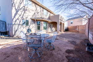 Back of property with a patio area