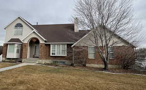 View of front of house with a front lawn