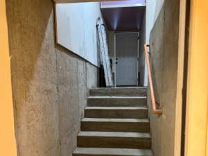 Staircase with concrete floors