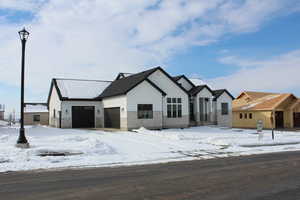 View of front facade with a garage