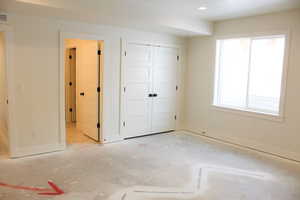 Unfurnished bedroom with a closet