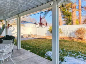 View of patio / terrace featuring an outdoor fire pit