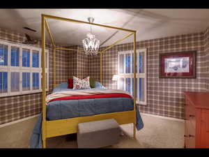 Carpeted bedroom featuring a notable chandelier