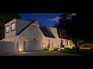 View of front of home featuring a garage