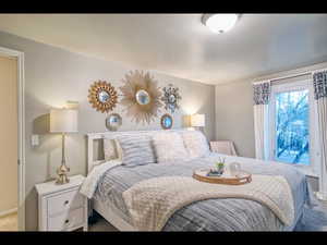 Bedroom featuring carpet floors