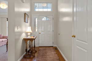 Foyer featuring hardwood / wood-style flooring