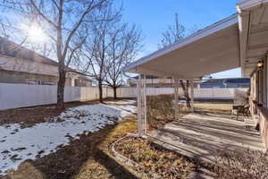 View of yard covered in snow