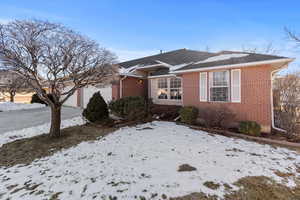 View of front of home featuring a garage