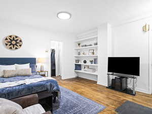 Bedroom featuring hardwood / wood-style flooring