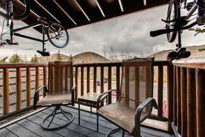 Wooden balcony and rock/swivel chairs