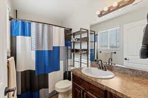 Primary suite's full bathroom.