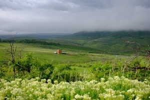 View of mountain feature with a rural view