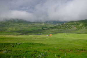 Property view of mountains with a rural view