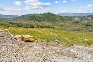 Property view of mountains with a rural view