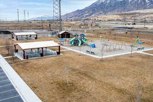 Exterior space featuring a mountain view and a playground