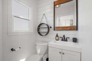 Bathroom with vanity and toilet