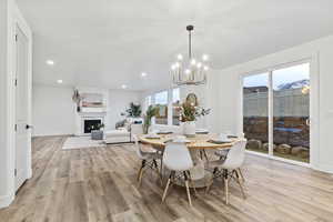 Open dining area featuring sliding doors to the backyard