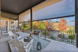 View of patio with an outdoor hangout area