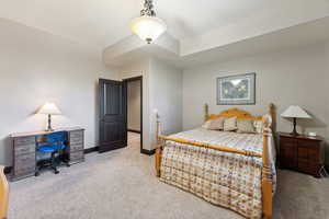 View of carpeted bedroom