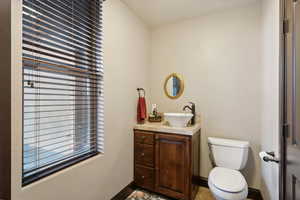 Bathroom with vanity and toilet