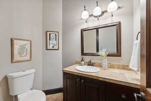 Bathroom with vanity and toilet