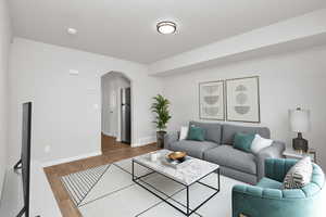 Living room featuring dark hardwood / wood-style floors