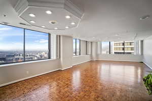 Empty room with parquet floors