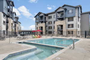 View of swimming pool featuring a patio