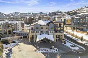 Snowy aerial view with a mountain view