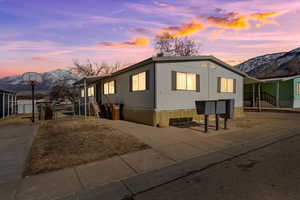 View of front of house with a mountain view