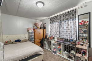 Bedroom with carpet