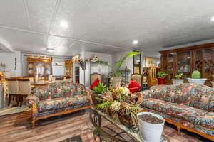 Living room featuring hardwood / wood-style flooring