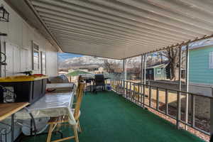 View of patio / terrace with a mountain view