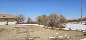 View of yard layered in snow