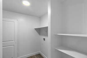 Laundry room offers additional shelving and the convenience of being placed on the same floor as the bedrooms