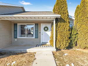 Entrance to property with a porch