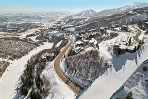 Snowy aerial view with a mountain view