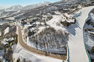 Snowy aerial view with a mountain view