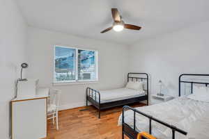 Main floor bedroom #2 with beautiful hardwood floors