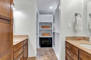 Master bathroom features separate vanities