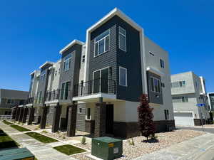 View of property with a garage