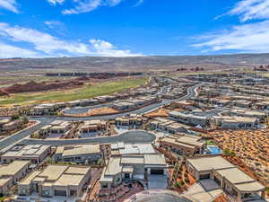 Birds eye view of property with a mountain view