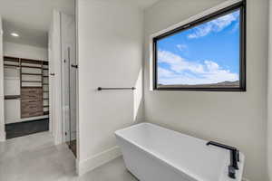 Bathroom with a washtub